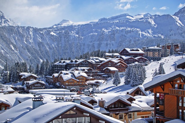Snow-clad luxury chalets in Courchevel, France
