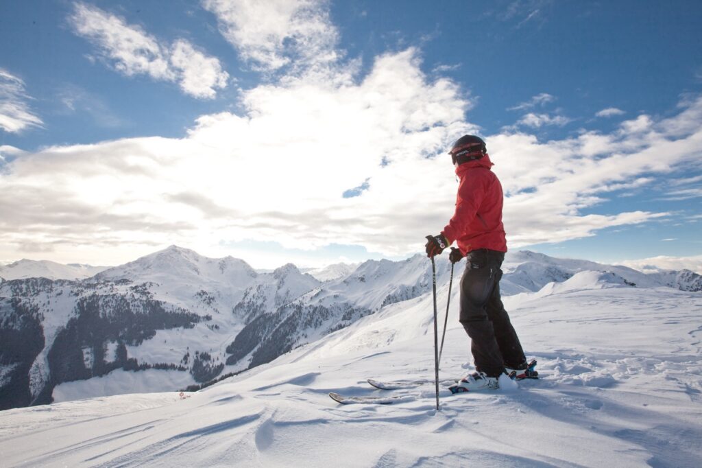 Skier looking at slope in Ski Juwel