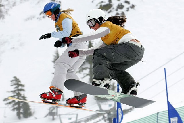 Palisades-Tahoe, CA, female snowboarders.