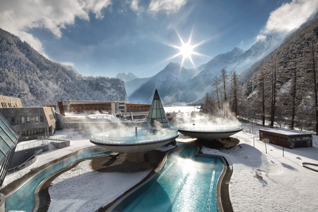 Aqua dome with steaming pools in the mountains