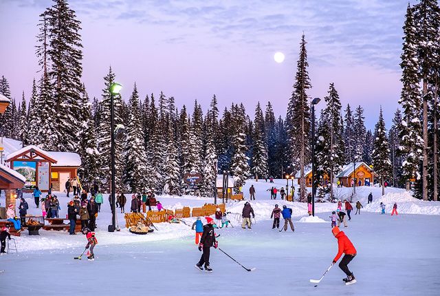 Playing hockey on Big White's ice rink. 